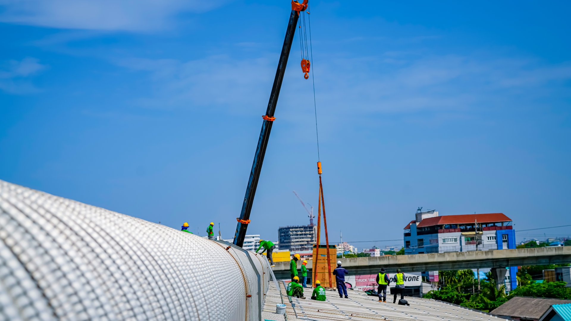 Crane-assisted equipment delivery